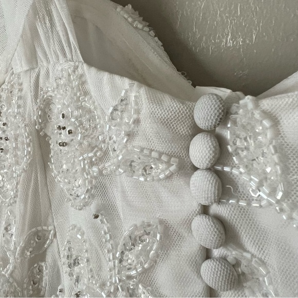 ASOS DESIGN Mila Floral Embellished Mesh Wedding Dress with Tie Straps in Ivory - Picture 8 of 8